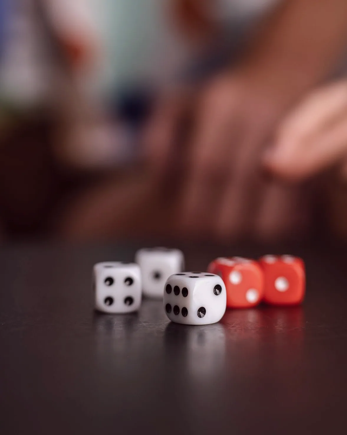 A hand of five hundred, mid-trick